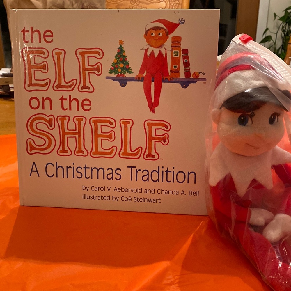 Elf on The Shelf book and doll; boy, brown hair and blue eyes.